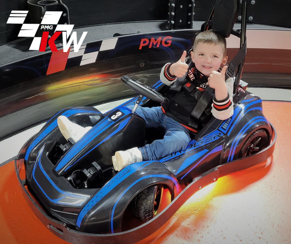 Child In A Cowabunga Kart giving a thumbs up